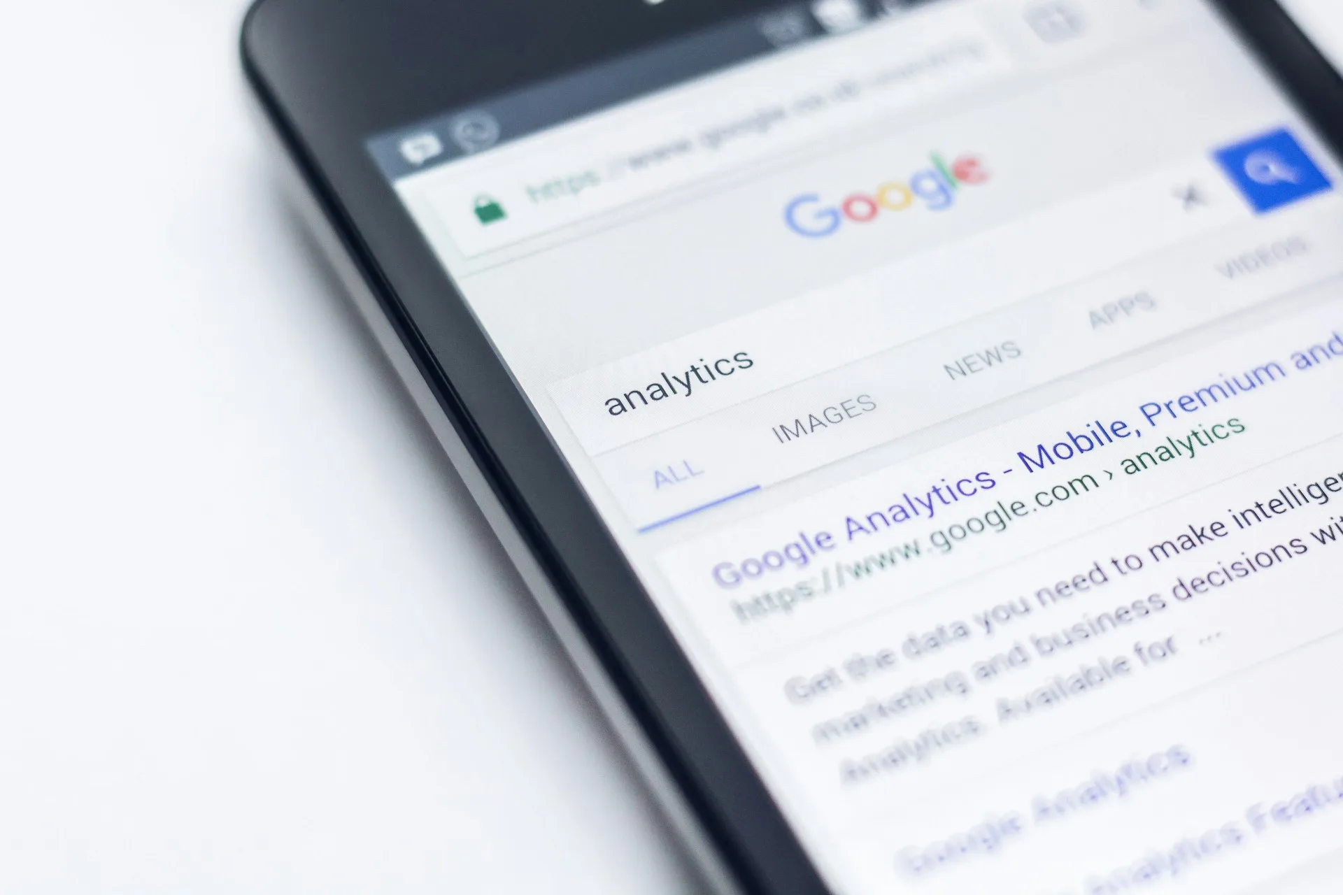 Smartphone showing a Google search, the first step buyers take before contacting a business